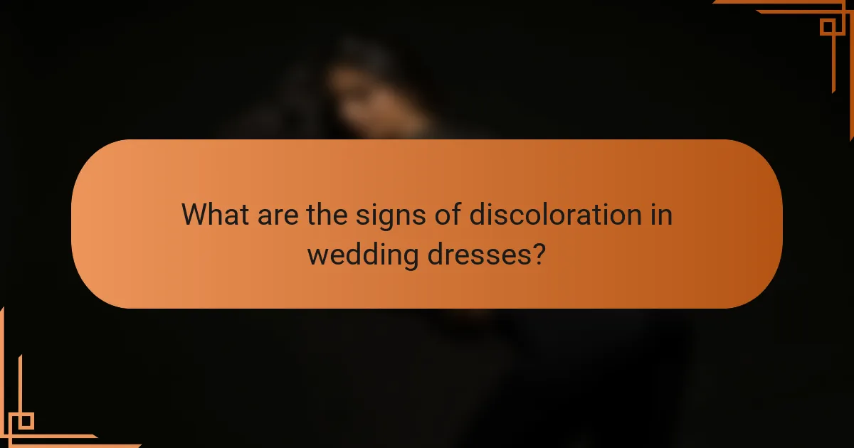 What are the signs of discoloration in wedding dresses?