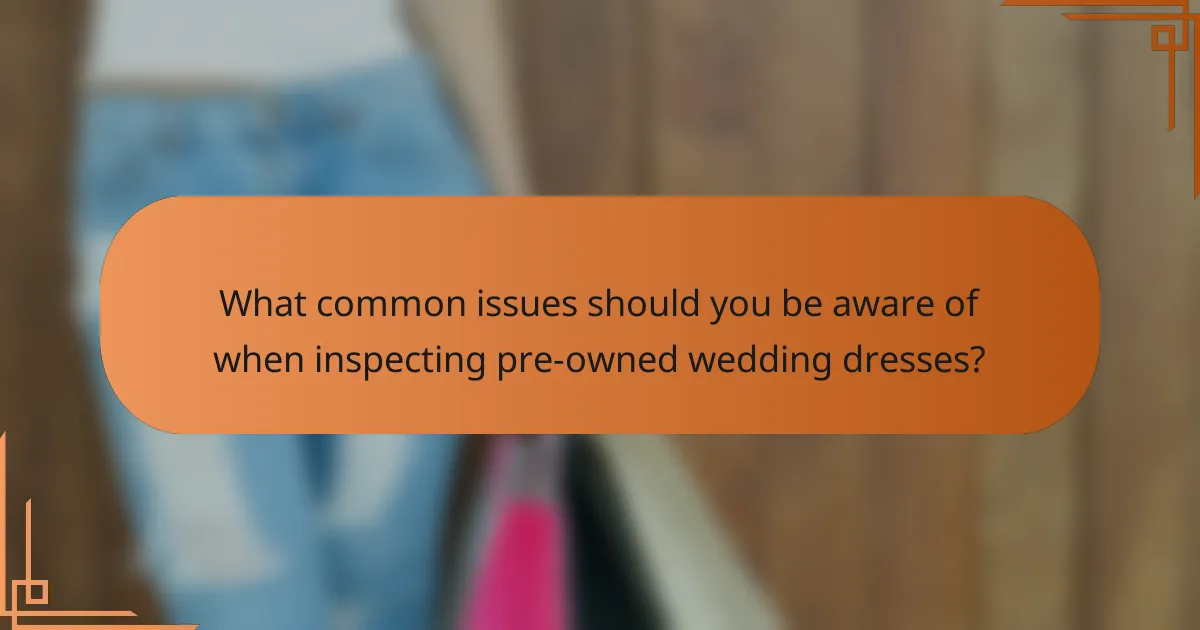 What common issues should you be aware of when inspecting pre-owned wedding dresses?